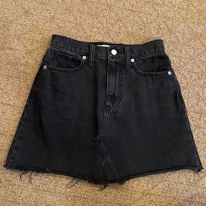 Black denim mini skirt